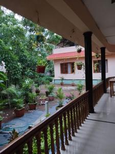 a view of a house from the balcony at AS Villa Homestay in Varkala