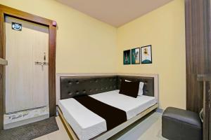 Ένα ή περισσότερα κρεβάτια σε δωμάτιο στο Hotel O Sanjay