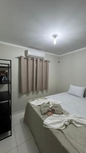 Katil atau katil-katil dalam bilik di Casa com 2 Quartos Climatizados e Garagem +9 gambar