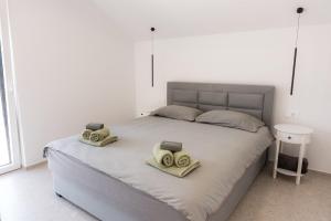 Postel nebo postele na pokoji v ubytování 5M kuća za odmor + 39 fotografií