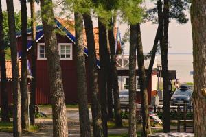 Fotografie z fotogalerie ubytování Waterfront Villa with Breathtaking Dune & Lagoon Views - Nida at Its Finest v destinaci Nida + 18 fotografií