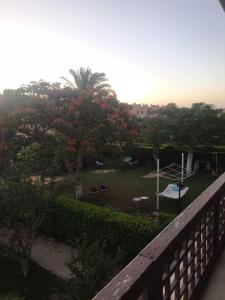 a view of a park from a balcony at chalet for rent at marina 7 el alamein 4 bedrooms air conditions marina card in El Alamein