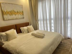 Ένα ή περισσότερα κρεβάτια σε δωμάτιο στο Paradise Haven +19 φωτογραφίες