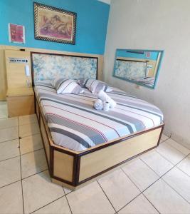 Ένα ή περισσότερα κρεβάτια σε δωμάτιο στο Hotel talismã +21 φωτογραφίες
