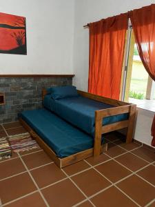 Postel nebo postele na pokoji v ubytování Cabañas & suites - Nono, Cordoba + 13 fotografií