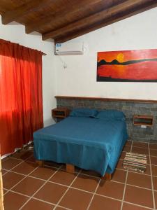 Postel nebo postele na pokoji v ubytování Cabañas & suites - Nono, Cordoba