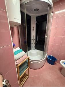 a bathroom with a shower and a sink at Sea&Sun in Sutomore