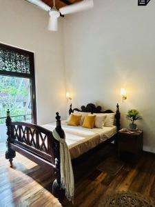 Кровать или кровати в номере Lumina Retreat Unawatuna Yoga and Residence