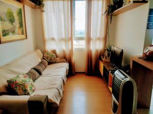 TV a/nebo společenská místnost v ubytování O Ninho do Galo