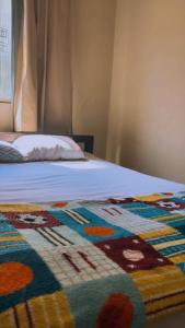 Postel nebo postele na pokoji v ubytování hotel no centro + 4 fotografie