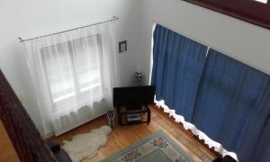 TV a/nebo společenská místnost v ubytování Lycorn