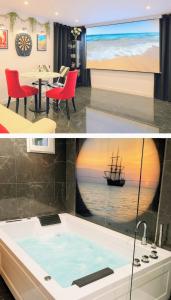 a bathroom with a bath tub with a boat on the wall at DRoom-Sauna Balneo & Cinema à Menton jusqu'à 4 invités in Menton