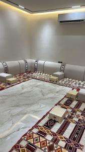 a room with a floor with tiles on it at وطن in Hafr Al-Batin