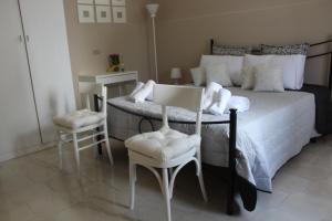 A bed or beds in a room at Domus Tua