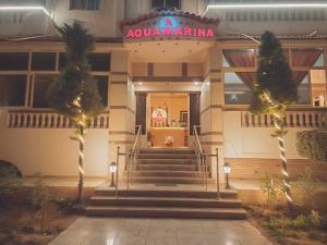 a building with a sign that reads ayala marina at Aqua Marina Ras ElBar in Ras El Bar