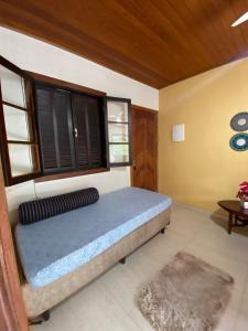 Katil atau katil-katil dalam bilik di Apartamento 2 quartos Vila do Abraão +21 gambar
