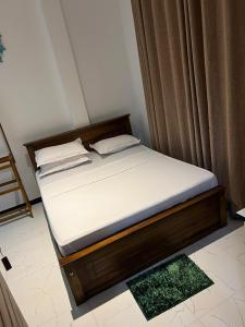Ένα ή περισσότερα κρεβάτια σε δωμάτιο στο URBAN Lodge +13 φωτογραφίες