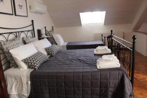 A bed or beds in a room at Domus Tua