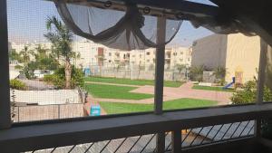 a view of a baseball field from a window at דירות לב אילת - lev eilat - מרחק 500 מטר מהים קניון וטיילת - מקבלים נוער in Eilat +1 photo
