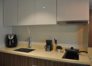 Dapur atau dapur kecil di Tambuli Ocean Breeze +37 gambar