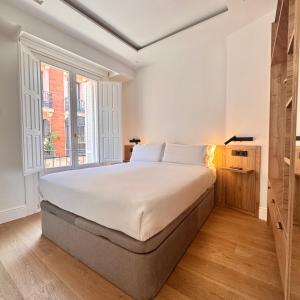 Voodi või voodid majutusasutuse Charming Plaza Mayor Views & Top location toas