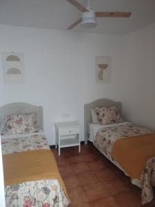 Ένα ή περισσότερα κρεβάτια σε δωμάτιο στο Casa Noray Mástil