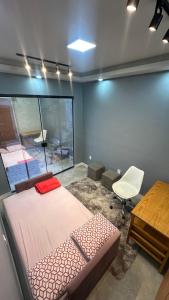 Ένα ή περισσότερα κρεβάτια σε δωμάτιο στο Quarto das Carambolas 2