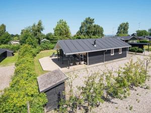 an overhead view of a house with a roof at Luxury Beach House with Spa - By Traum Ferienwohnungen in Sjølund