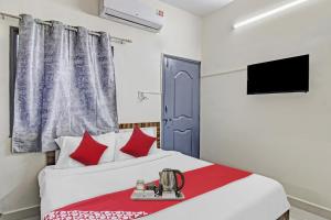 Katil atau katil-katil dalam bilik di Hotel O Pritesh Grand