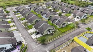 an overhead view of a suburb with houses at RuzZana Signature Stay Semi-D Corner Lot-BBQ,Wifi,6-8pack in Kota Tinggi