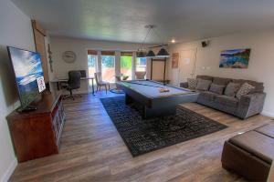 a living room with a pool table in it at NVH0823 - Sadies Hustle home in Zephyr Cove