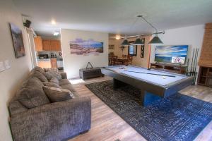 a living room with a pool table in it at NVH0823 - Sadies Hustle home in Zephyr Cove