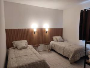 Postel nebo postele na pokoji v ubytování Departamento Luz de Lino