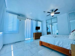 Ένα ή περισσότερα κρεβάτια σε δωμάτιο στο Apartartamento cabarete