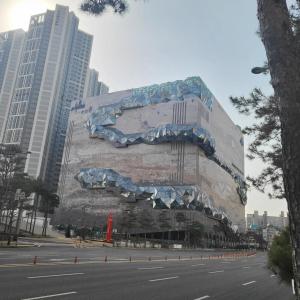 a building with a painting on the side of it at #Long-term accommodation inquiries#Suwon Convention Center#Gwanggyo Lake Park#Daily bedding change in Suwon