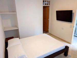 TV a/nebo společenská místnost v ubytování Casa corazón del pueblo