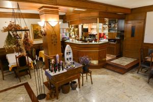 a large kitchen with a table in a room at Guest House Bakhus in Žerjavka