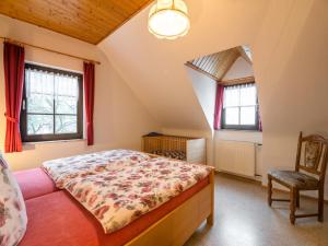 Katil atau katil-katil dalam bilik di Eschfeld Sauna Apartment