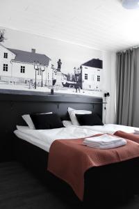 Кровать или кровати в номере Forenom Aparthotel Raahe