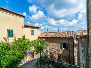 an alley in an old town with buildings at Romantic Getaway with Views in Montecastelli Pisano