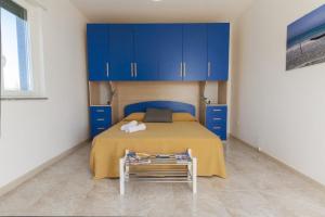 Postel nebo postele na pokoji v ubytování La Finestra Sul Mare