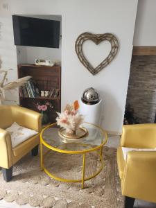 Χώρος καθιστικού στο Une petite maison seulement pour 2