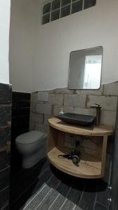 a bathroom with a sink and a toilet at B&B VIA NAPOLI LEVERANO in Leverano +54 photos