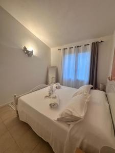 Postel nebo postele na pokoji v ubytování Ea Bianca Vibes + 34 fotografií