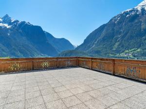 a balcony with a view of a mountain range at Apartment in Ötz near Hochoetz Ski Area in Sautens