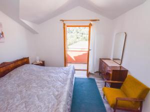 Ένα ή περισσότερα κρεβάτια σε δωμάτιο στο Holiday Home in Veli Iž near the Sea