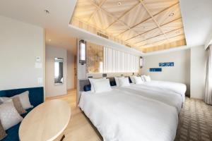 Katil atau katil-katil dalam bilik di Centrair Hotel