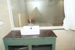 Koupelna v ubytování Restinn