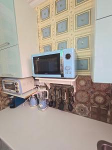 TV a/nebo společenská místnost v ubytování EWA Apartman HAJDÚSZOBOSZLÓ + 45 fotografií