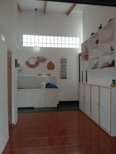 Kuchyň nebo kuchyňský kout v ubytování Malapasqua Island Cottage Holiday House